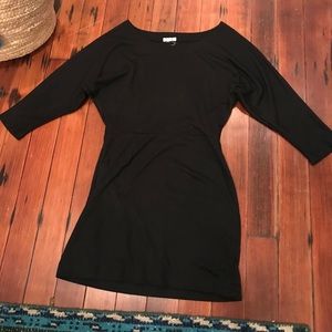 Black shift dress. Cinches at waist.